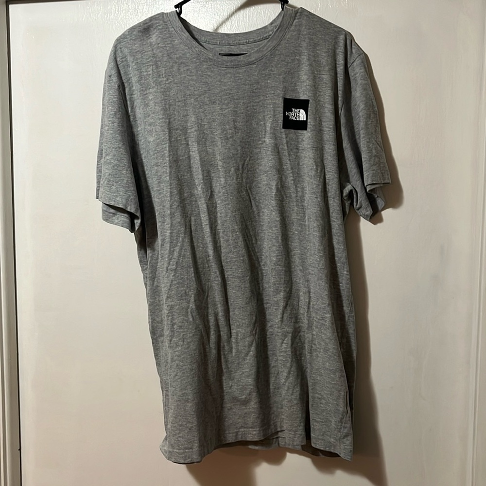 The north face shirt grey front and back designs